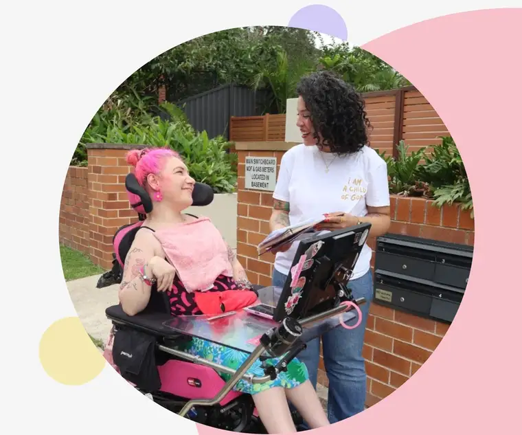 Yosmerys with a young person, community setting
